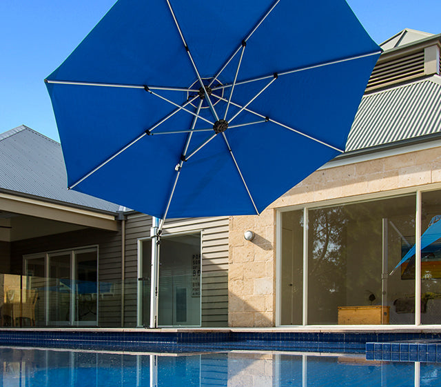 Homecrest Sol Cantilever Umbrella — lifestyle